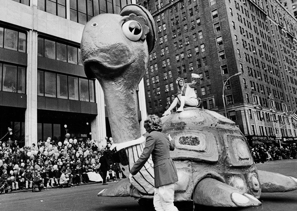 Street view of a tortoise float near Columbus Circle.